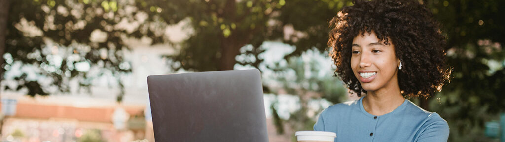 Woman looking at laptop screen